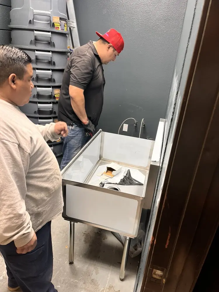 Commercial plumbing and sink installation in Advance